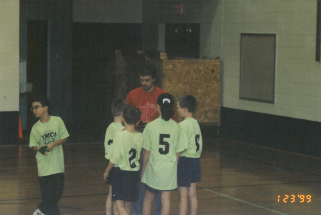 Meg Grimes as a child playing basketball