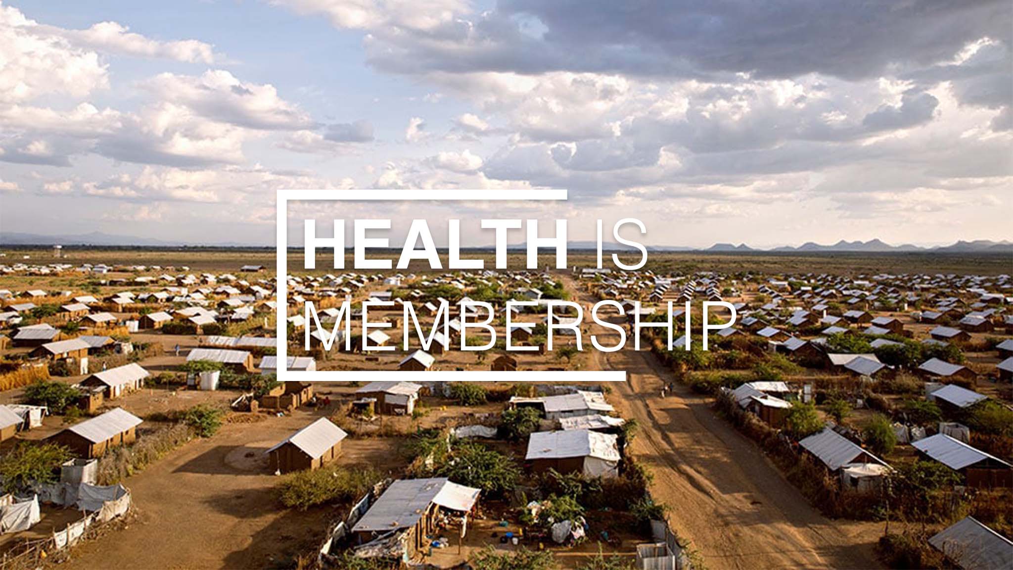 health is membership wording over image of a village