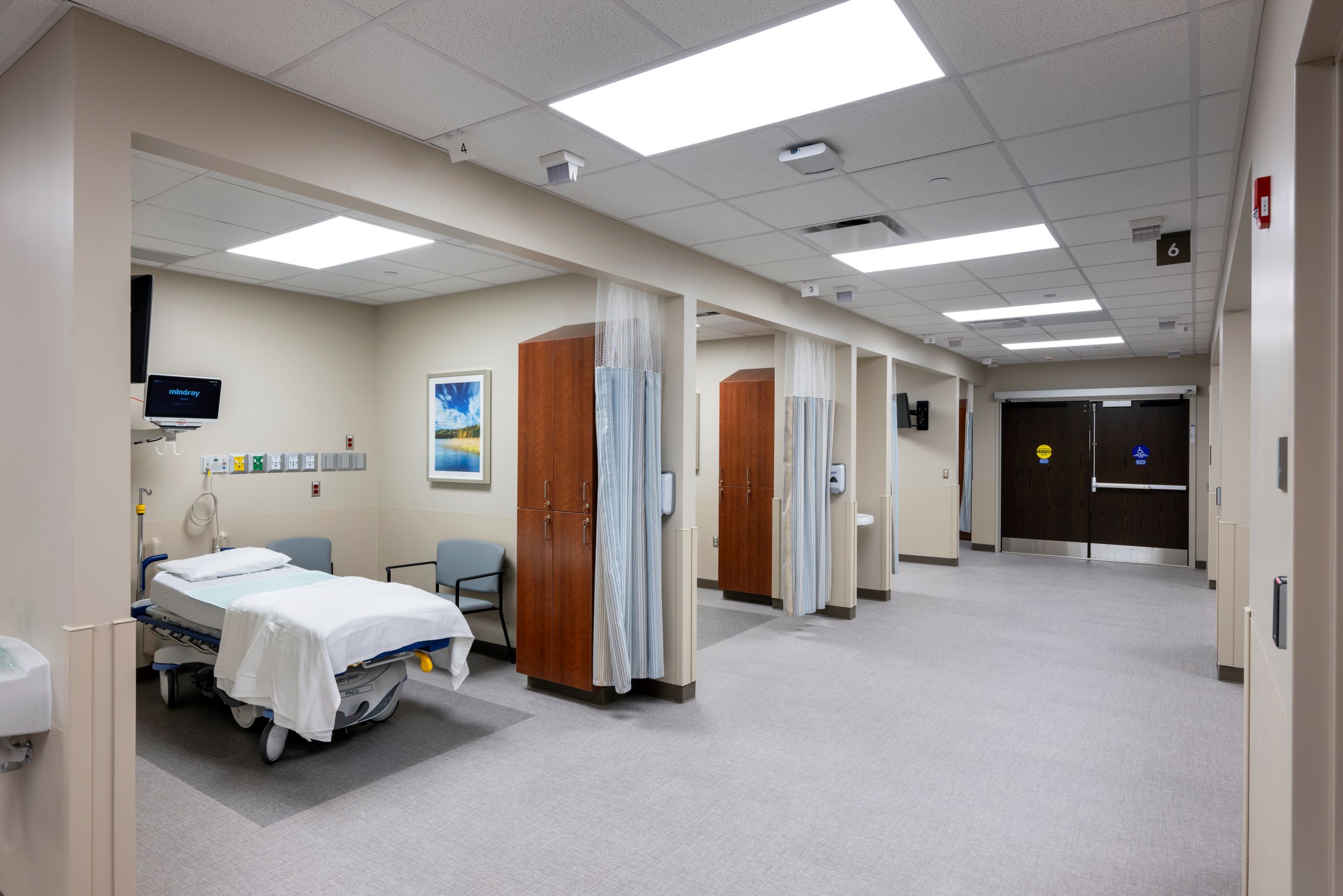 bed in a pre/post patient area of hospital