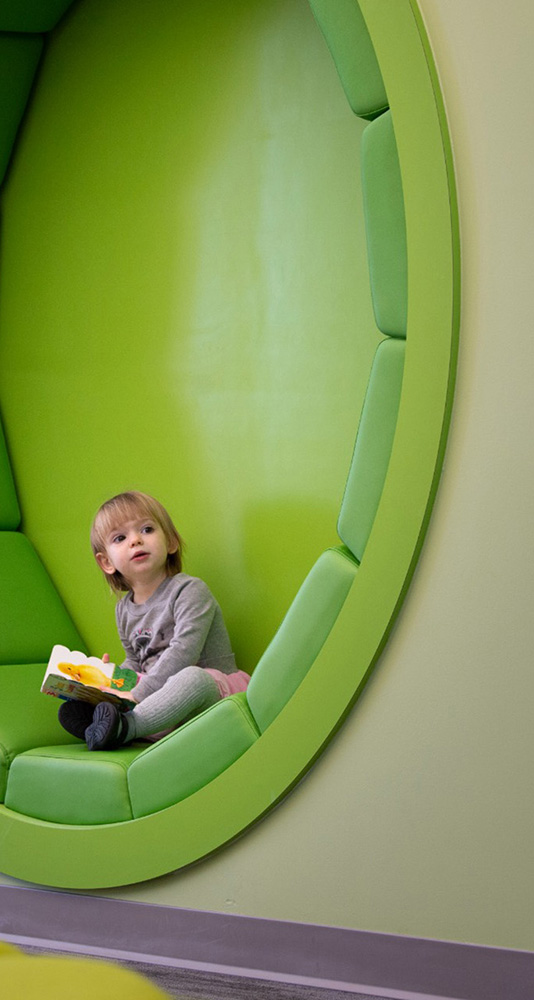 Child sitting in Library