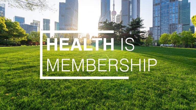 Health is Membership title with city park background