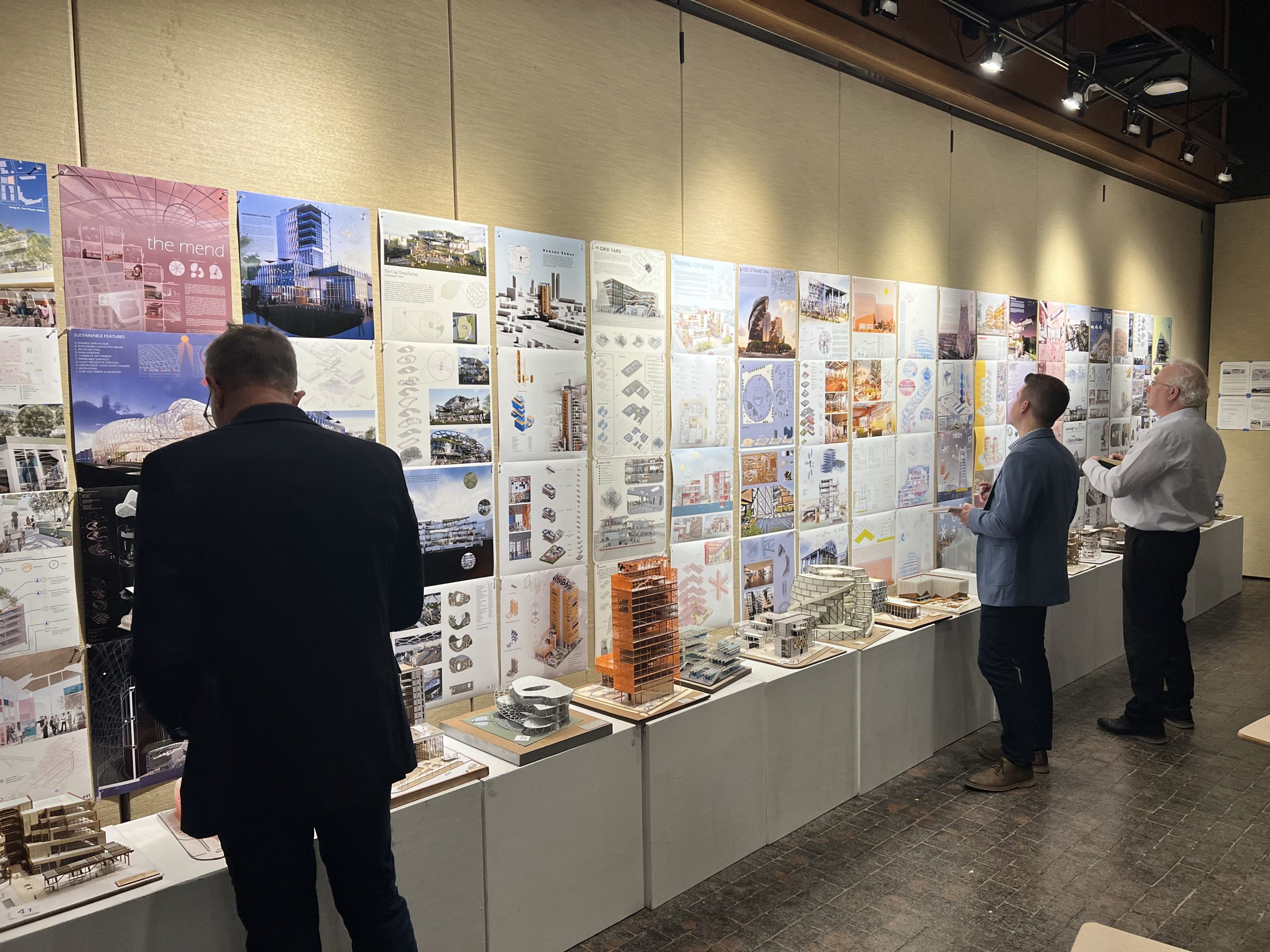 people looking at architecture design displays