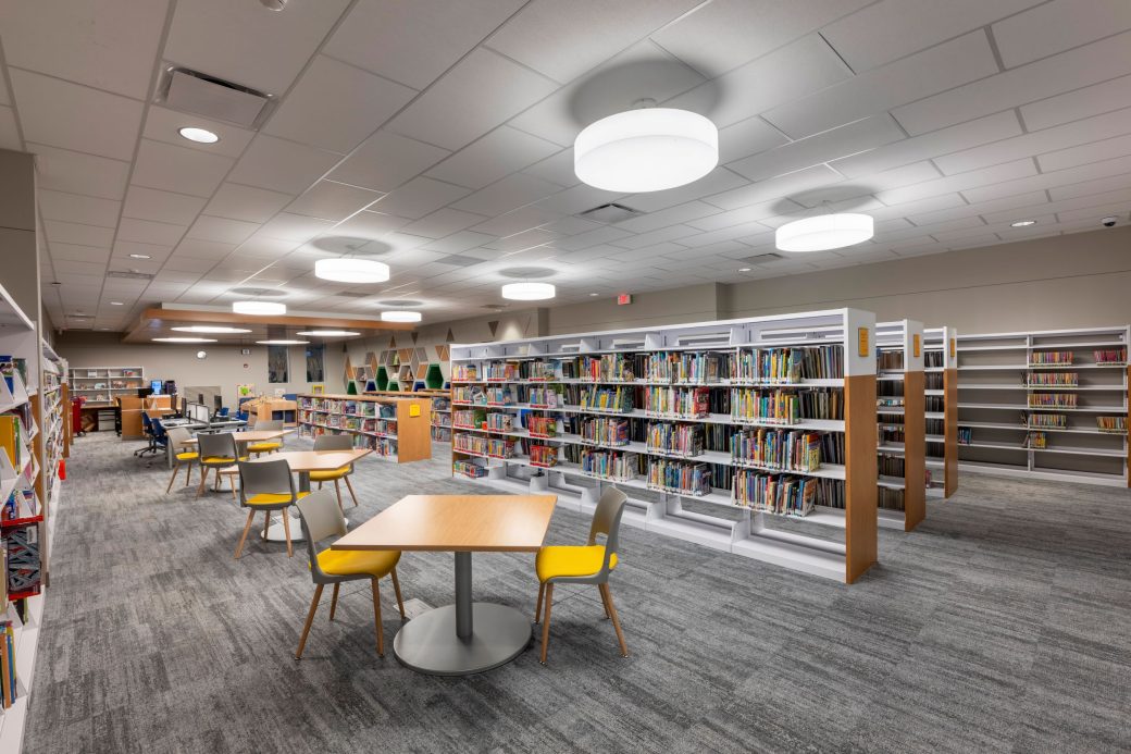 tables and chairs in children's library area