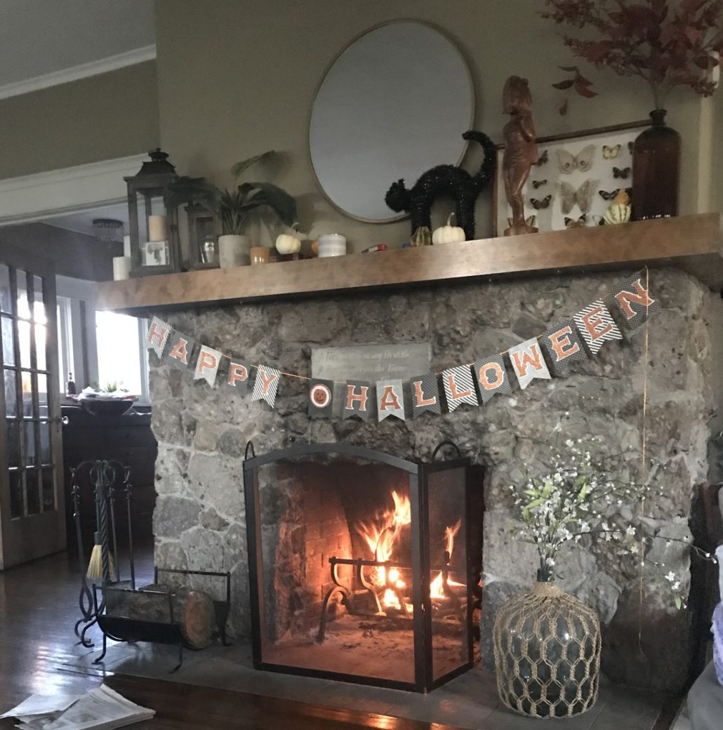 hearth with fire and halloween decor