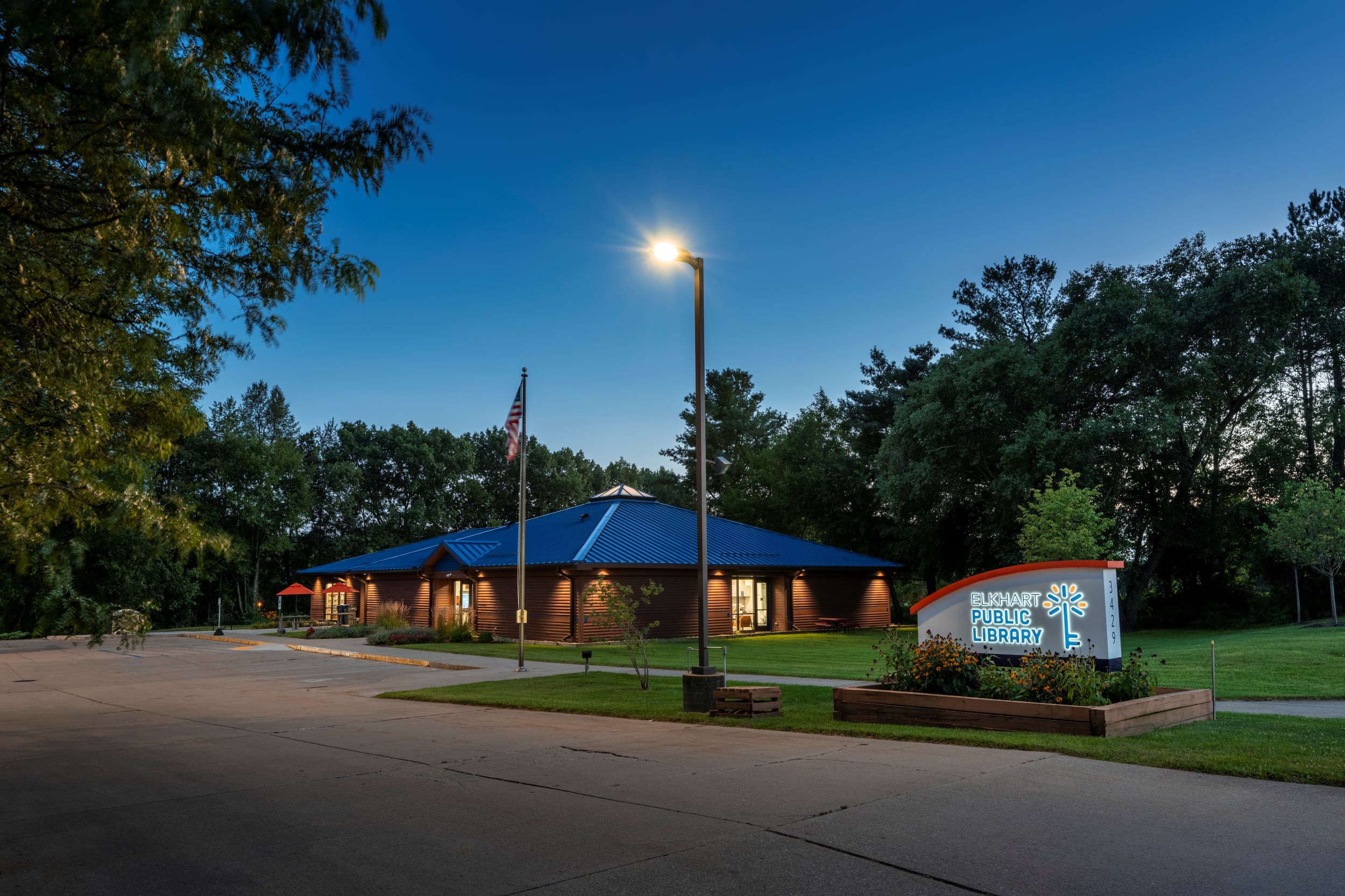 exterior of library and parking lot dusk