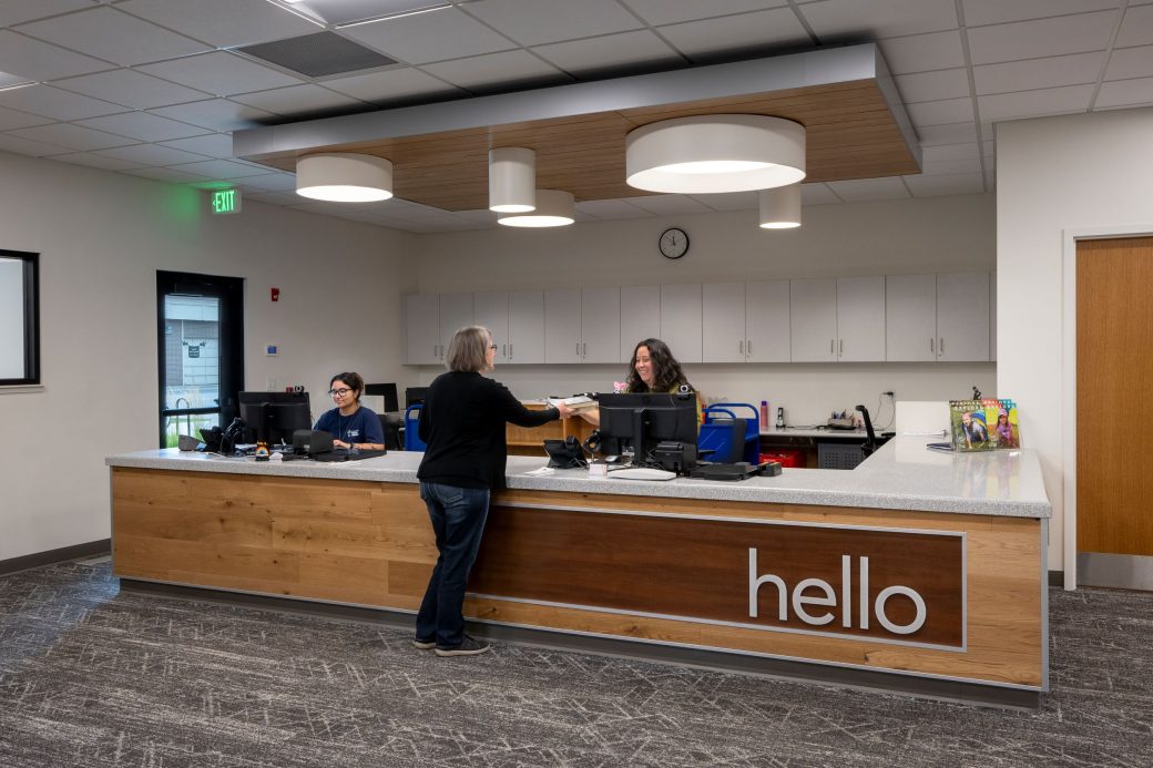 circulation desk with person checking out