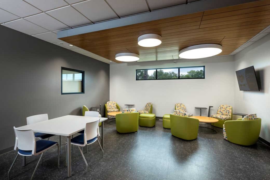lounge with green chairs
