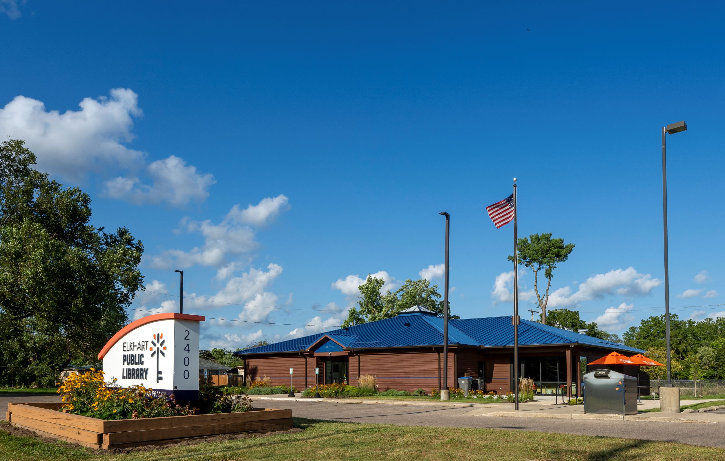 front exterior of library with blue roof